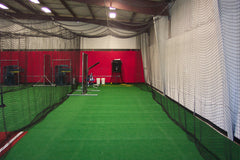 Nylon cage runner and turf install in a batting cage, located in Ft. Meyes FL